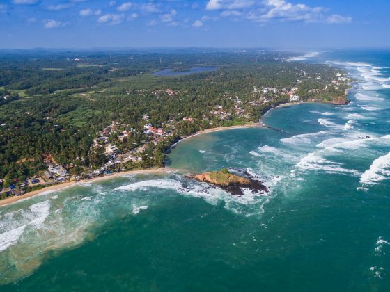Mirissa Beach | Image Credit: By dronepicr (Mirissa beach aerial) [CC BY 2.0], via Wikimedia Commons